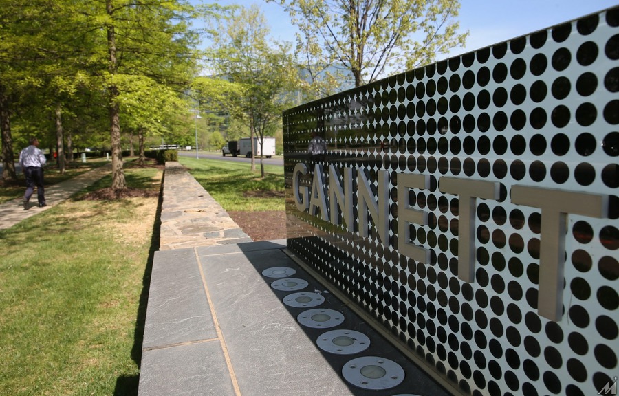 <p>TYSONS CORNER, VA – APRIL 25:  A sign in front of Gannett Co Inc, headquarters is shown, on April 25, 2016 in Tysons Corner, Virginia. The Gannett Company has offered to buy Tribune Publishing Co in a deal valued at about $815 million.  (Photo by Mark Wilson/Getty Images)</p>