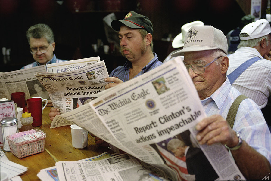 <p>Local men reading THE WICHITA EAGLE newspaper account of Starr Report, Independent Counsel Ken Starr’s grand jury report on Clinton/Lewinsky affair, released by Congress.    (Photo by Steve Liss/Getty Images)</p>