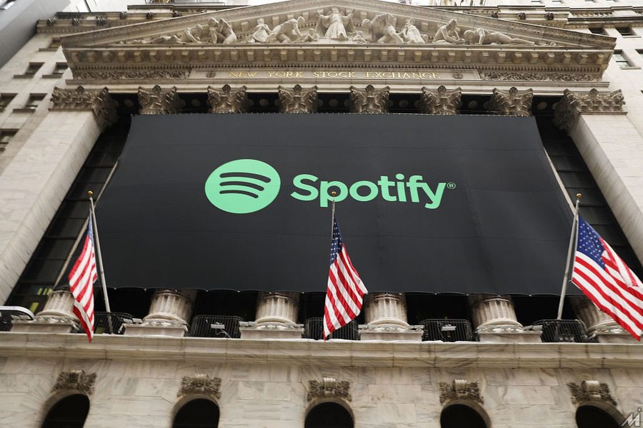<p>NEW YORK, NY – APRIL 03: The Spotify banner hangs from the New York Stock Exchange (NYSE) on the morning that the music streaming service begins trading shares at the NYSE on April 3, 2018 in New York City.  Trading under the symbol SPOT, the Swedish company’s losses grew to 1.235 billion euros ($1.507 billion) last year, its largest ever.  (Photo by Spencer Platt/Getty Images)</p>