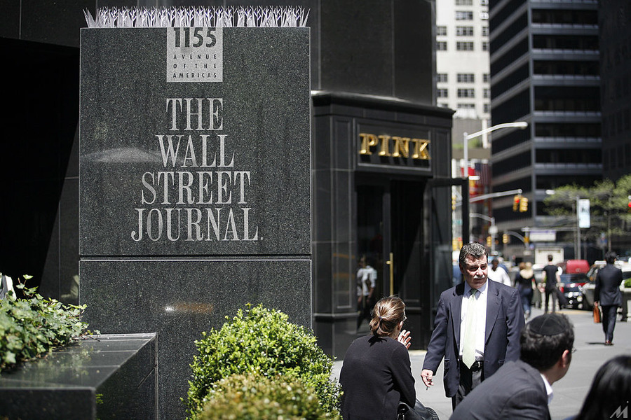 <p>NEW YORK – MAY 1:  Pedestrians walk past the Wall Street Journal building at 1155 6th Avenue May 1, 2007 in New York City.  Rupert Murdoch’s News Corporation made an unsolicited bid of $5 billion for Dow Jones and Co., the parent company of the The Wall Street Journal.  (Photograph by Michael Nagle/Getty Images)</p>