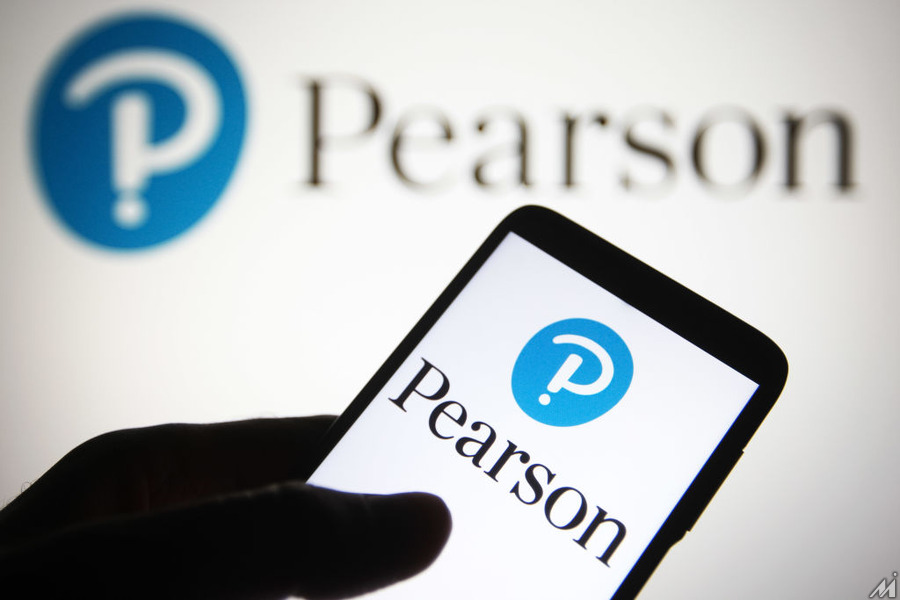 <p>UKRAINE – 2021/07/31: In this photo illustration, Pearson plc logo of a British multinational publishing and education company seen displayed on a smartphone. (Photo Illustration by Pavlo Gonchar/SOPA Images/LightRocket via Getty Images)</p>