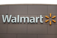 <p>CHICAGO, ILLINOIS – MAY 19: A sign hangs outside of a Walmart store on May 19, 2020 in Chicago, Illinois. Walmart reported a 74% increase in U.S. online sales for the quarter that ended April 30, and a 10% increase in same store sales for the same period as the effects of the coronavirus helped to boost sales. (Photo by Scott Olson/Getty Images)</p>
