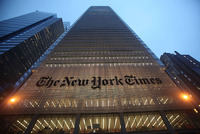 <p>NEW YORK – DECEMBER 07:  The New York Times’ masthead is displayed in front of the midtown headquarters on December 7, 2009 in New York City. Today is the deadline for Times staffers to accept a buyout package in an effort to eliminate 100 newsroom employees this year in the struggling economy. The newspaper will likely fall short of the 100 buyouts and will need to layoff staffers to cut costs.  (Photo by Mario Tama/Getty Images)</p>