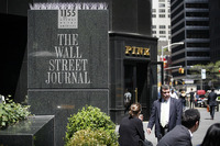 <p>NEW YORK – MAY 1:  Pedestrians walk past the Wall Street Journal building at 1155 6th Avenue May 1, 2007 in New York City.  Rupert Murdoch’s News Corporation made an unsolicited bid of $5 billion for Dow Jones and Co., the parent company of the The Wall Street Journal.  (Photograph by Michael Nagle/Getty Images)</p>