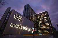 <p>BERLIN, GERMANY – JANUARY 06:  The corporate headquarters of Axel Springer Verlag publishing house, which includes Germany’s biggest tabloid newspaper, Bild Zeitung, stands illuminated on January 6, 2011 in Berlin, Germany. Bild Zeitung Editor-in-Chief Kai Diekmann and German President Chistian Wulff are locked into a war of words over a message Wulff left on Diekmann’s mobile phone in which he reportedly demanded that Bild not publish a compromising story about Wulff’s personal financial conduct while governor of Lower Saxony. In a recent television interview Wulff claimed he only asked Diekmann to postpone publication of the story by a day.  (Photo by Sean Gallup/Getty Images)</p>